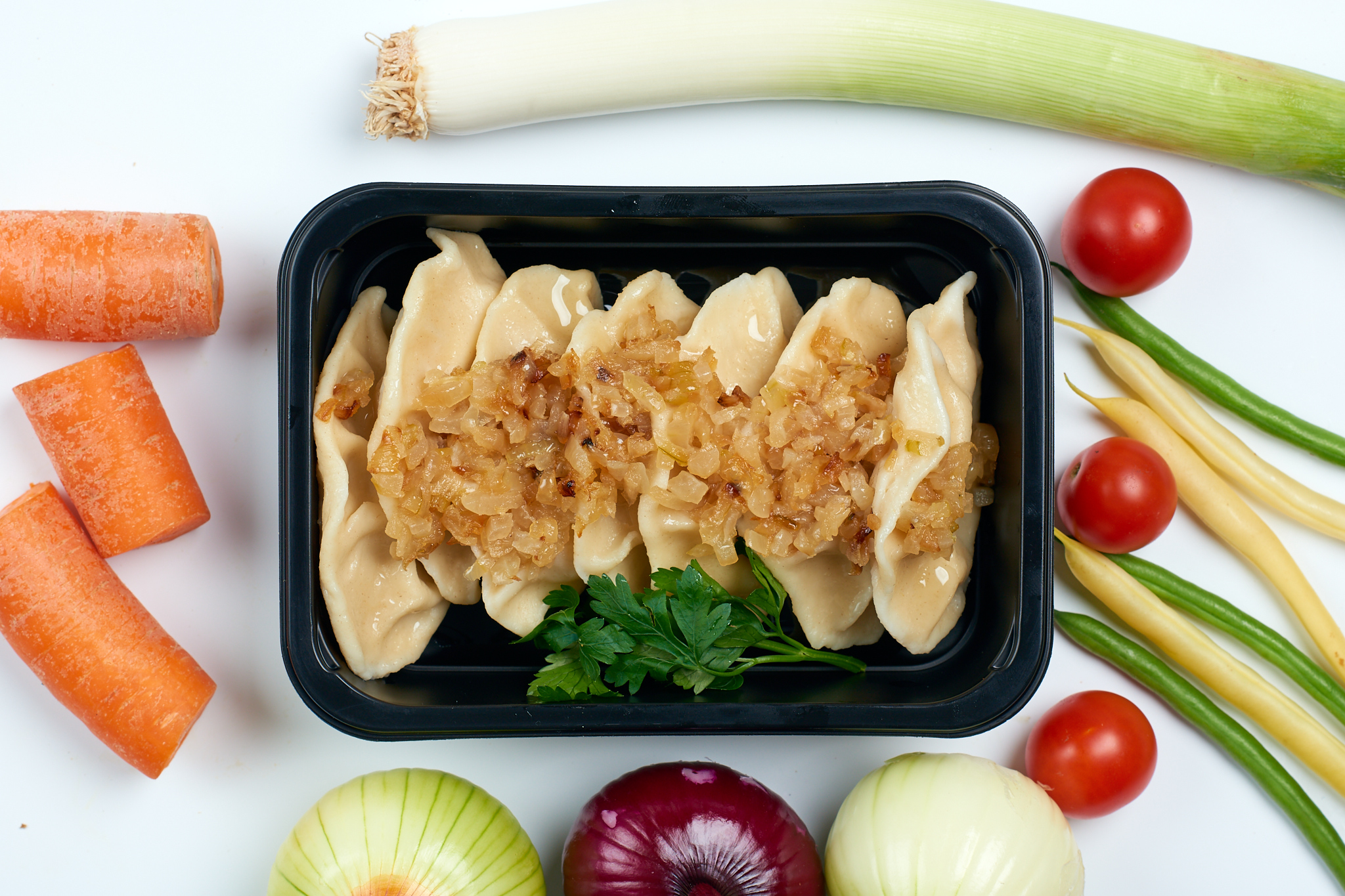 Pierogi ruskie, okrasa z cebuli duszonej