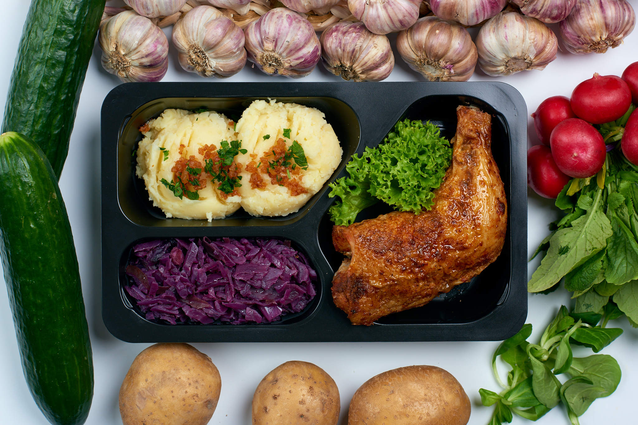 Roasted chicken leg, puree, sauteed red cabbage